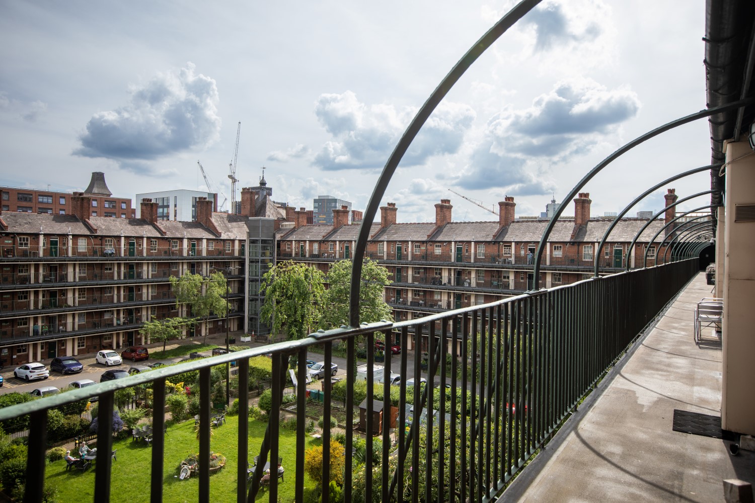 Lovely view from the walkway of a social home looking out over the rest of the estate and green space.