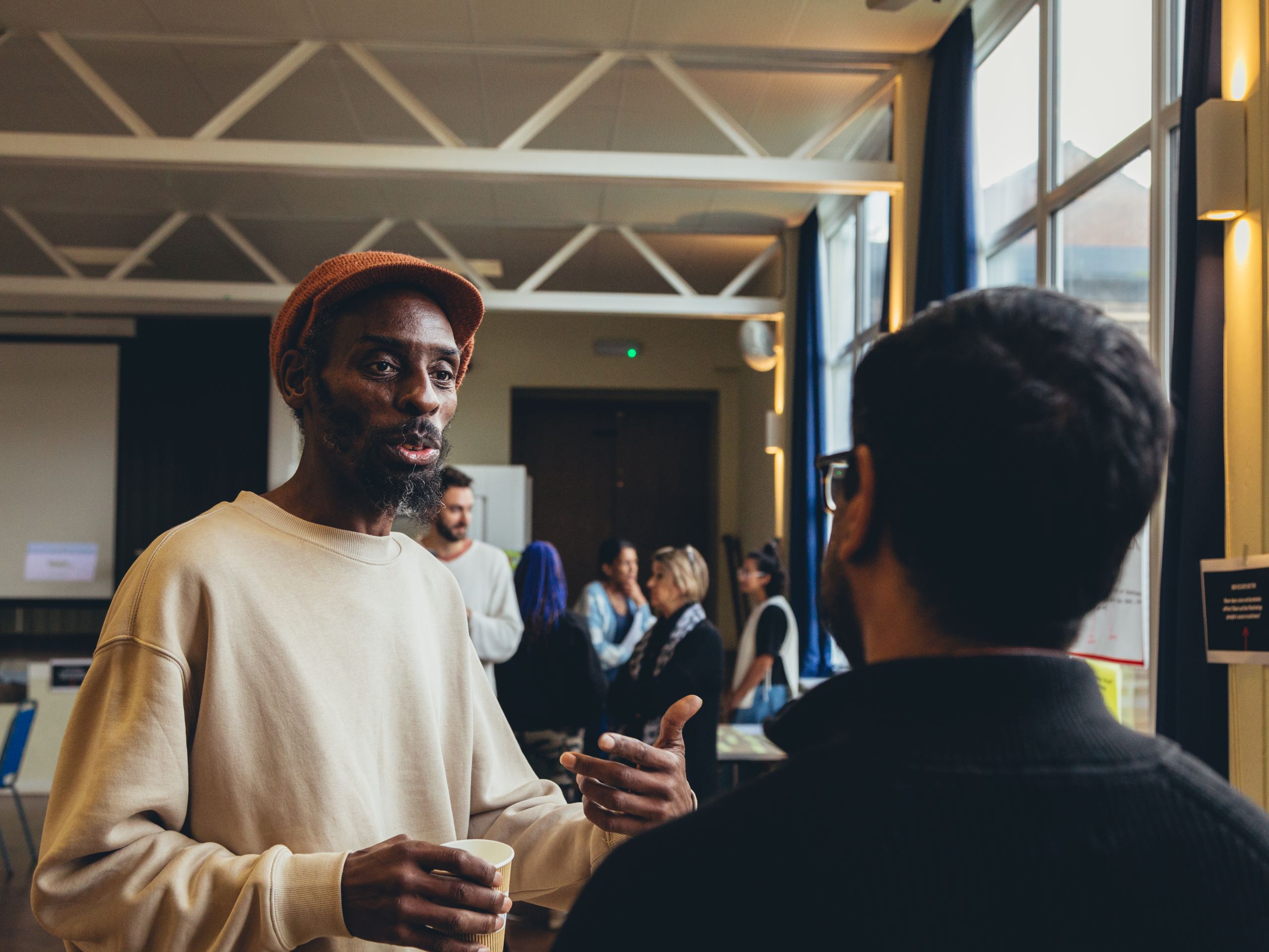 Simon in conversation at a peer researcher event for the co-production of the research underpinning this campaign.